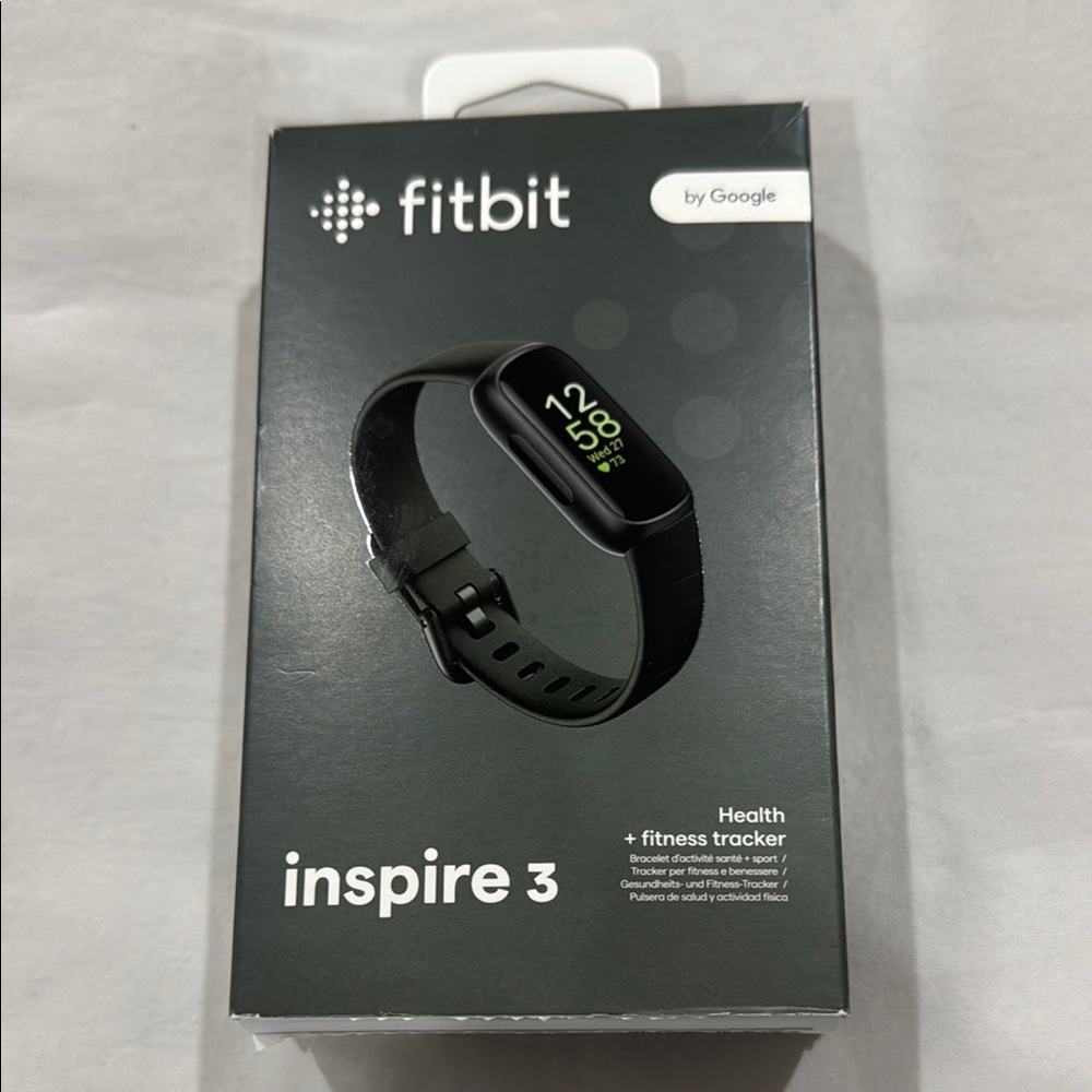 Fitbit Black Smartwatch with Sleek Design and Digital Display